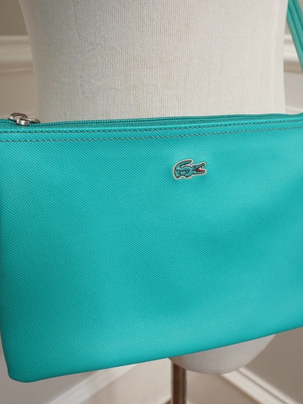 Lacoste Teal crossover bag PVC w/leather trimming